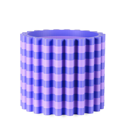 Blue and purple striped large flowerpot on a white background