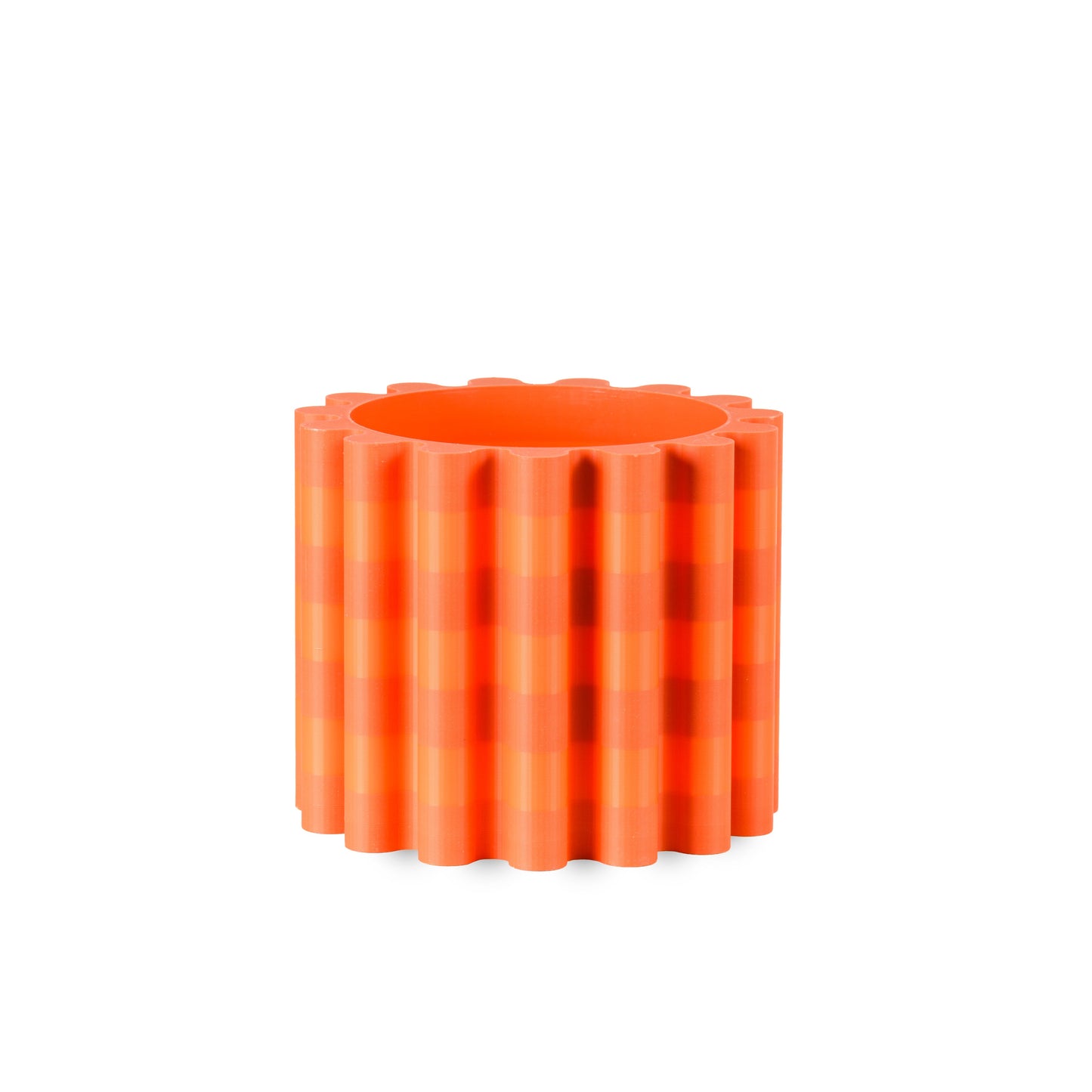 Orange striped flowerpot with wavy surface on a white background