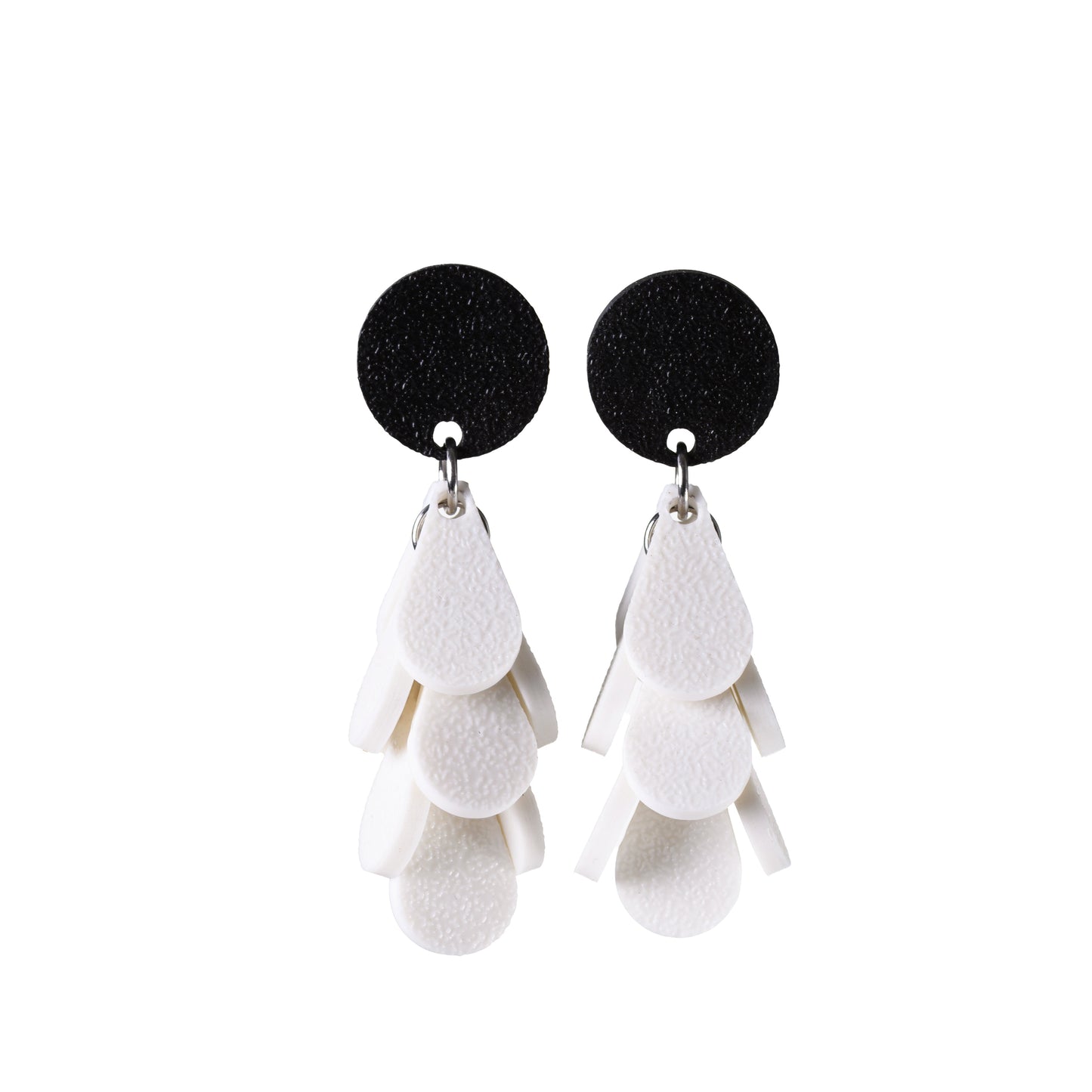 Black and white dangle earrings on a white background