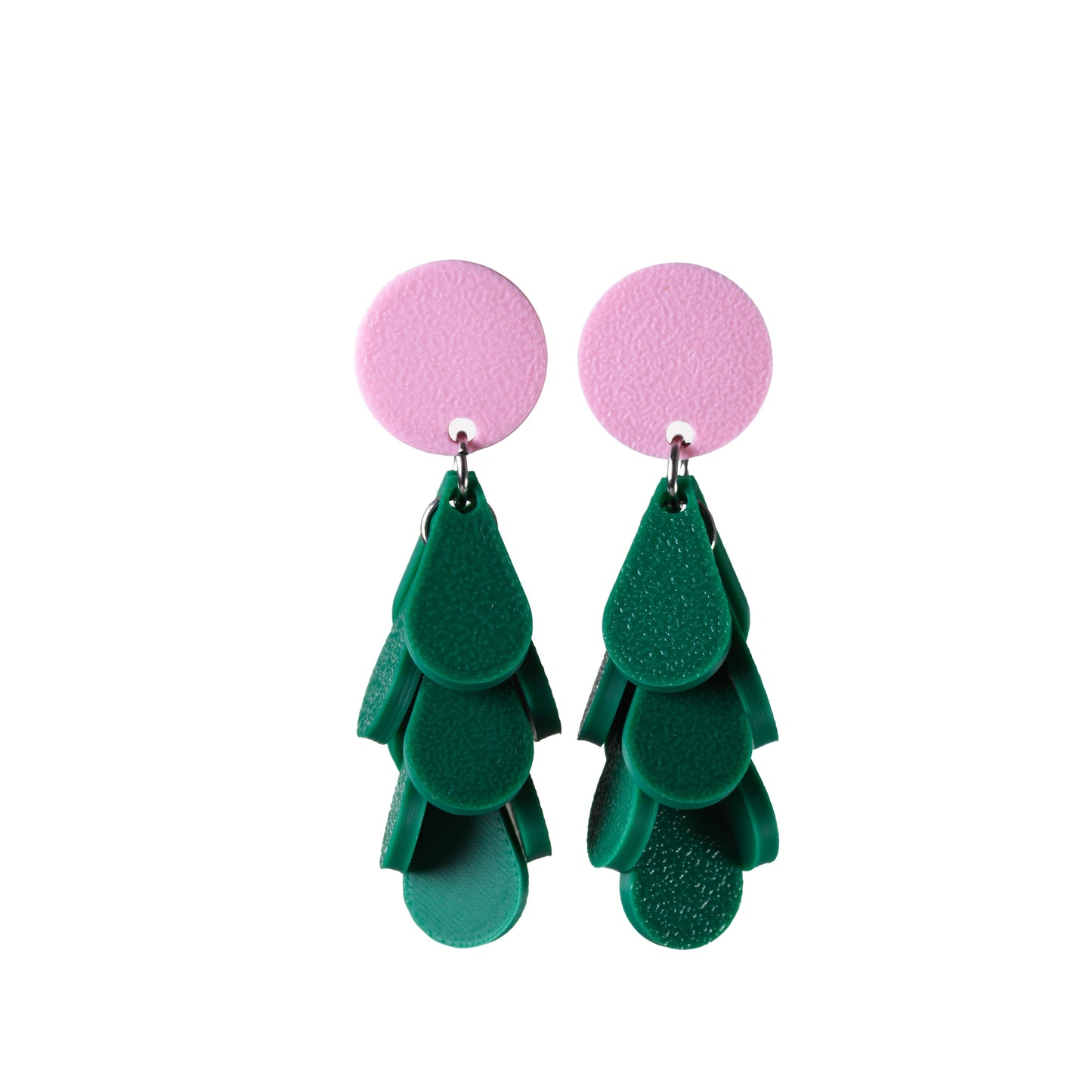 Green and pink plastic dangle earrings on a white background